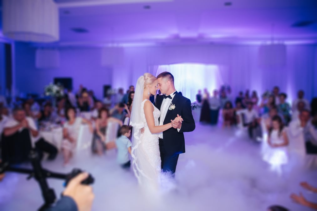 Bride and Groom Dancing on Wedding Reception  